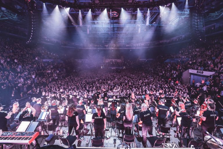 image of an orchestra used to highlight the fact that managing a chronic health condition is like conducting an orchestra.